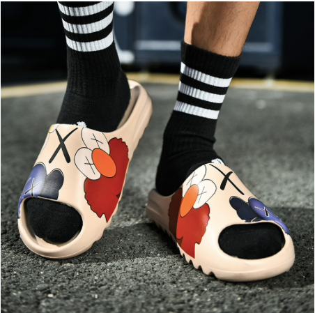 Yeezy x discount kaws slides price